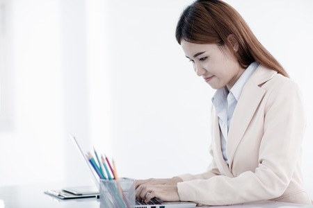 young asian businesswoman working in officeの写真素材