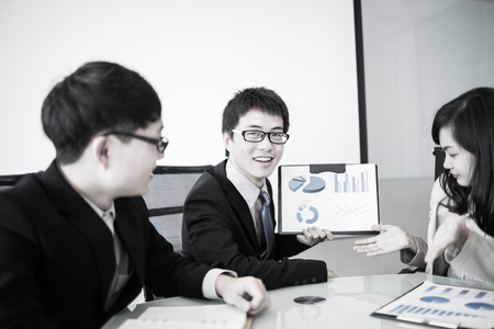 Successful business meeting with a group of people at the office.Asianの写真素材