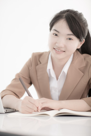 young asian businesswoman working in officeの写真素材