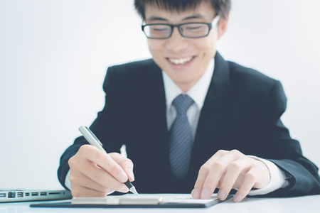 Businessman analyzing investment charts. Accountingの写真素材