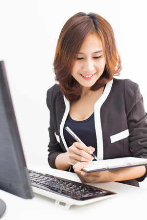 young asian businesswoman working in officeの写真素材