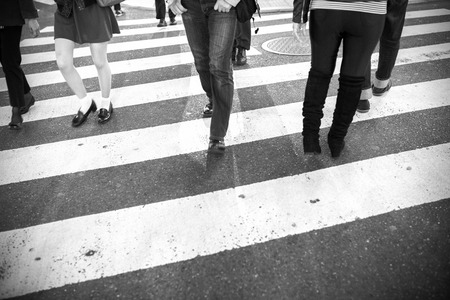 Group of people crossing the streetの写真素材