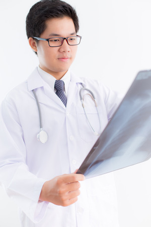 close up of male doctor holding x-ray or roentgen imageの写真素材