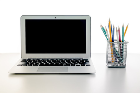 Still-life portrait of computer with pencilの写真素材