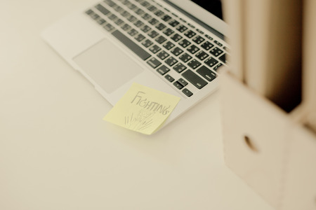 Laptop with adhesive note