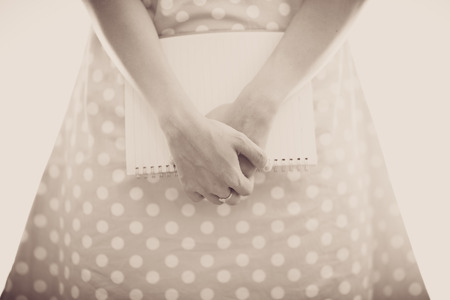 Portrait young woman holding book