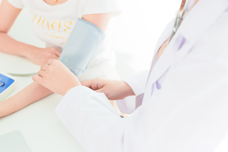 Professional doctor working in officeの写真素材