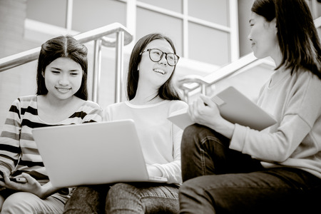 group of happy teen high school students outdoorsの写真素材