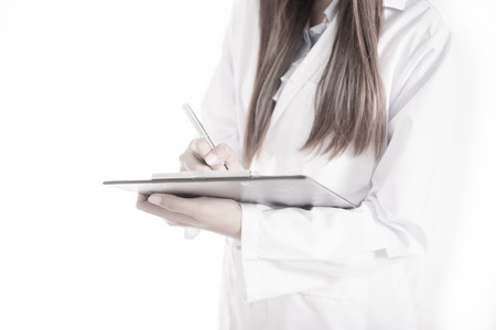 Smiling medical doctor woman with stethoscopeの写真素材