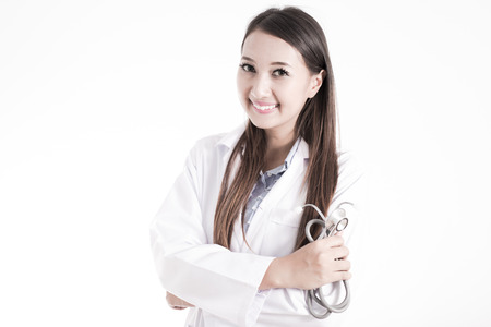 Smiling medical doctor woman with stethoscopeの写真素材