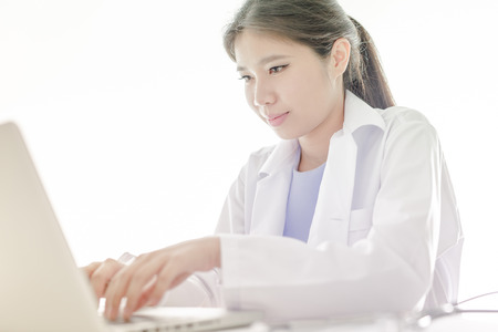 Young and professional doctor working in officeの写真素材