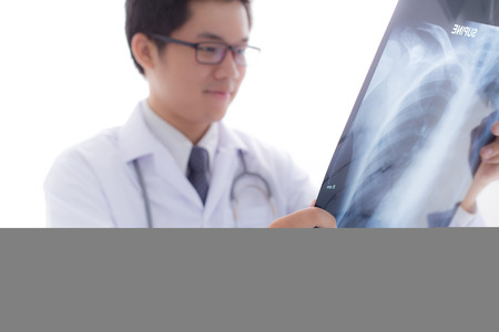 close up of male doctor holding x-ray or roentgen imageの写真素材