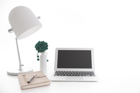 Stylish workspace with computer on homeの写真素材