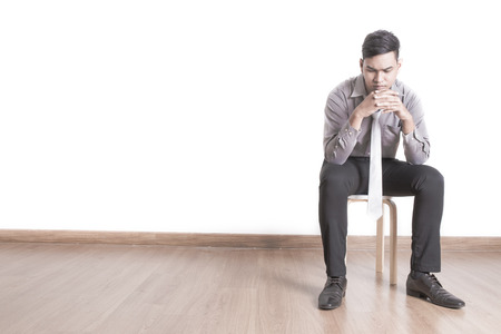 Isolated young business man depressiveの写真素材