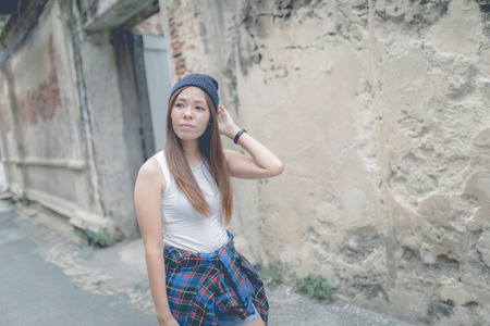 Young beautiful girl in abandoned houseの写真素材