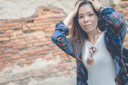 Young beautiful girl in abandoned houseの写真素材