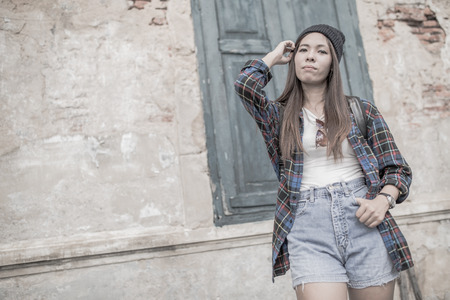 Young beautiful girl in abandoned houseの写真素材