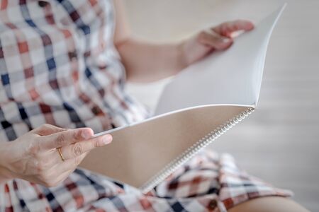 attractive female college student sitting
