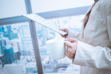 Woman taking notes during business meeting in the office.の写真素材