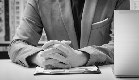 Businessman analyzing investment charts. Accountingの写真素材