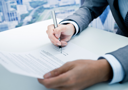 Business man signing a contract