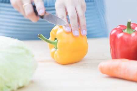 Salad preparation - cutting fresh vegetables into pieces