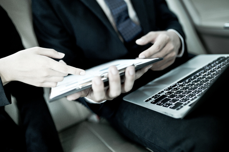 Young business team working together in the carの写真素材