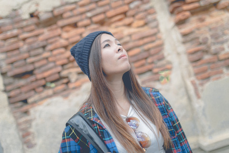 Young beautiful girl in abandoned houseの写真素材