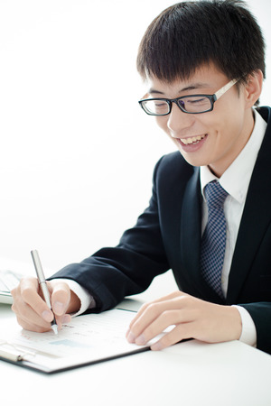 Businessman analyzing investment charts. Accountingの写真素材