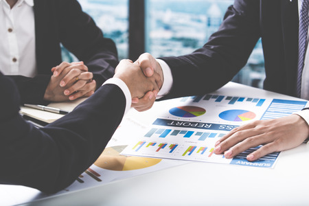 Business handshake and business peopleの写真素材