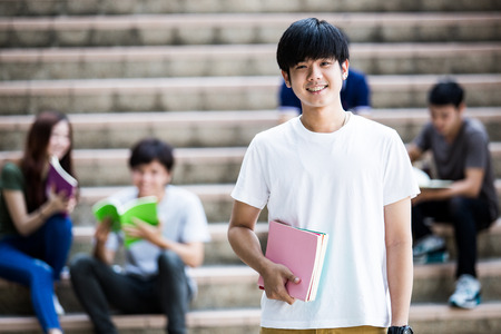 group of happy teen high school students outdoorsの写真素材