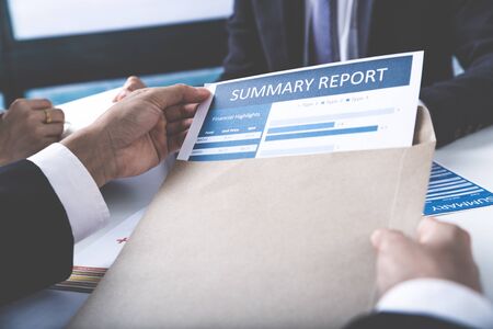 Group of business people busy discussing financial matter during meeting