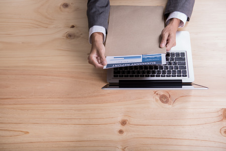 Closeup of businessman hands typing on laptop computerの写真素材