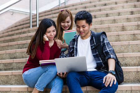 Friends and education, group of university students studyingの写真素材