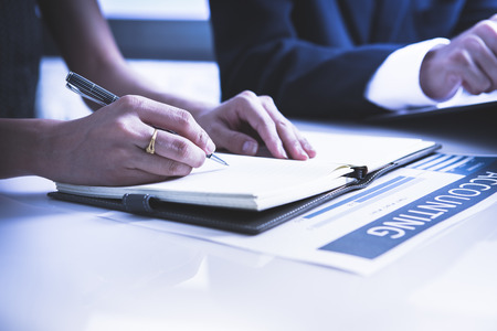 Business people meeting to discuss the situation on the marketの写真素材