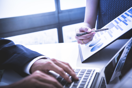 Business people meeting to discuss the situation on the marketの写真素材