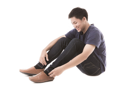 Young man isolated on white. Asian male modelの写真素材