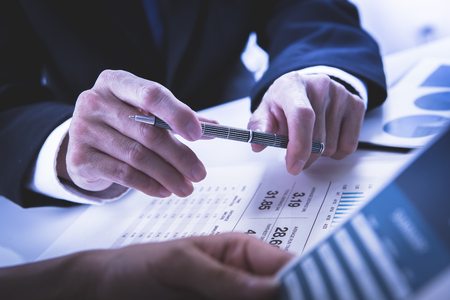 Business people meeting to discuss the situation on the marketの写真素材