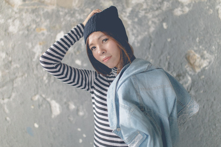 Young beautiful girl in abandoned houseの写真素材