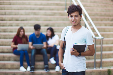 group of happy teen high school students outdoorsの写真素材