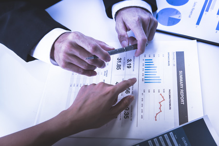 Business people meeting to discuss the situation on the marketの写真素材