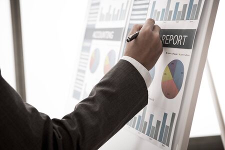 Businessman analyzing investment charts. Accountingの写真素材