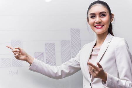 businesswoman giving a presentation in a companyの写真素材