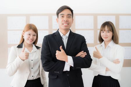 Portrait of businesspeople standing in office. Asian peopleの写真素材