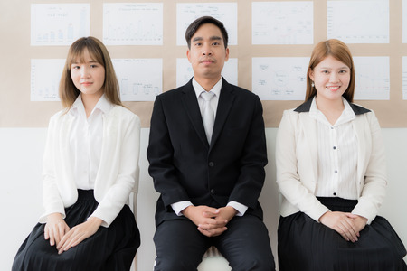 Stressful people waiting for job interview. Asian peopleの写真素材
