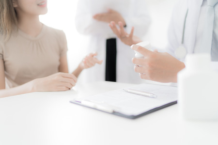 Doctors and patient talking about therapy. Asian peopleの写真素材
