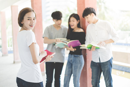 Group of happy teen high school students outdoorsの写真素材