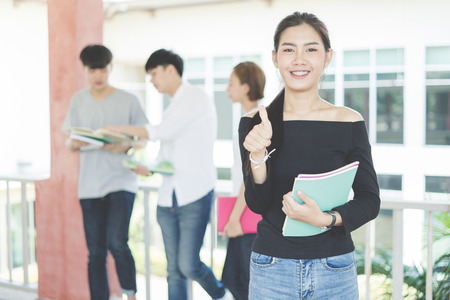 Group of happy teen high school students outdoorsの写真素材