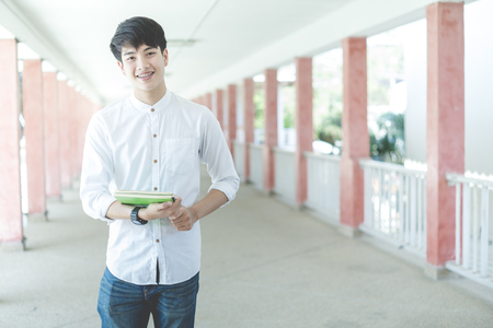 Happy teen high school students outdoorsの写真素材