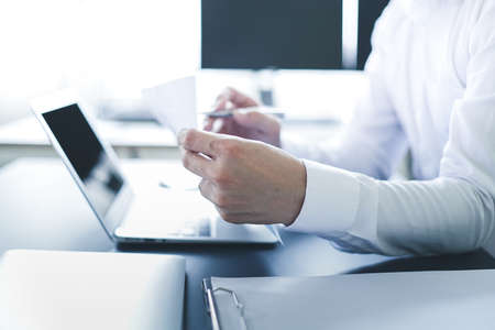 Young businessman in casual clothes at modern startup business office spaceの写真素材